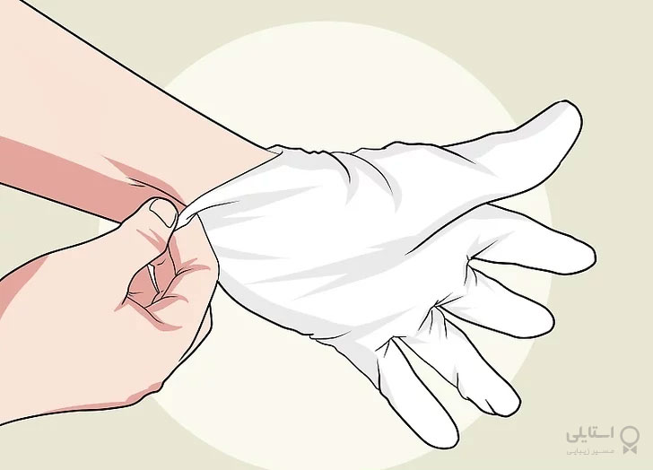 پوشیدن دستکش‌ یکبار مصرف 