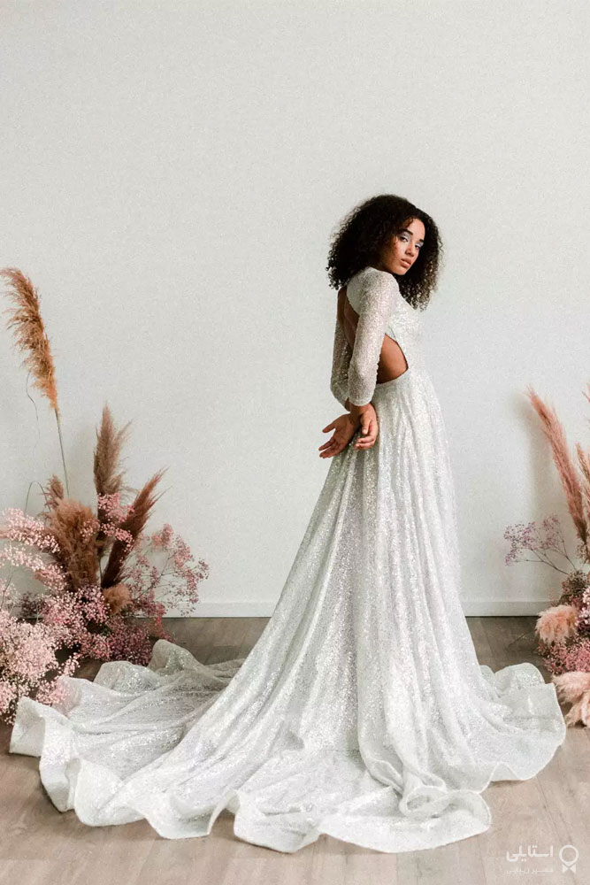مدل لباس عروس دامن بلند و چین‌دار